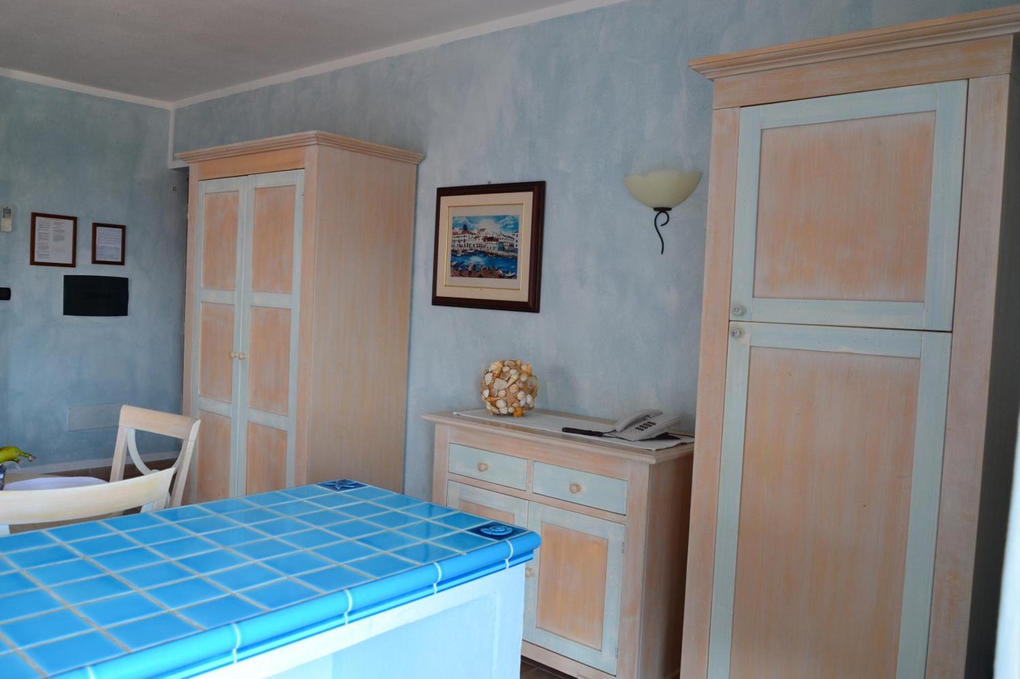 Hotel Villa Del Parco Ла-Маддалена Номер фото